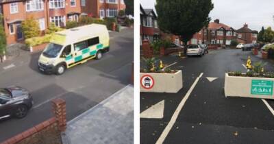 Moment ambulances forced to U-turn due to traffic planters as angry residents blast council in war of words