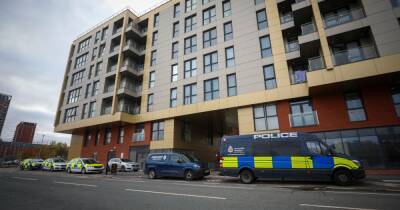 Armed police raid luxury apartment block in Salford and arrest two men over shooting in Morecambe