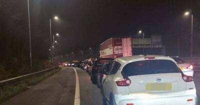 Six injured and woman cut from car after 'serious' crash between car and lorry on M60