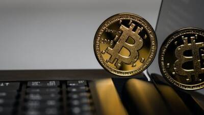Bitcoin falls 6.1%; price slides below $50,000 again