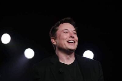 Dogecoin value jumps after Elon Musk tweets it can be used to buy Tesla merchandise