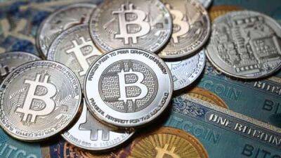 Crypto brokerage Genesis suspends withdrawals at lending arm