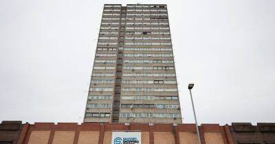 Three released under investigation as death of man at Salford tower block remains a mystery