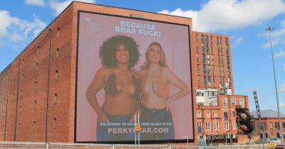 Huge 'busty billboard' with reality TV star appears on side of Salford tower block