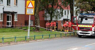 Investigation underway after eight people rescued from apartment block fire