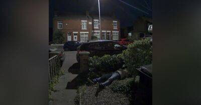 Surprise as doorbell camera shows drunken man ASLEEP in stranger's front garden