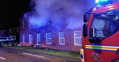 Police praise 'heroic' firefighters who saved a man's life after rescuing him from burning flat