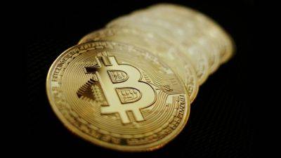 Bitcoin hits fresh record above $71,000